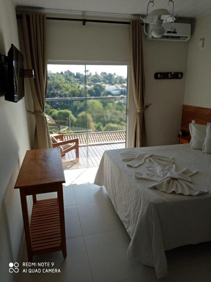 Hotel Escarpas Do Lago กาปีตอลิโอ ภายนอก รูปภาพ
